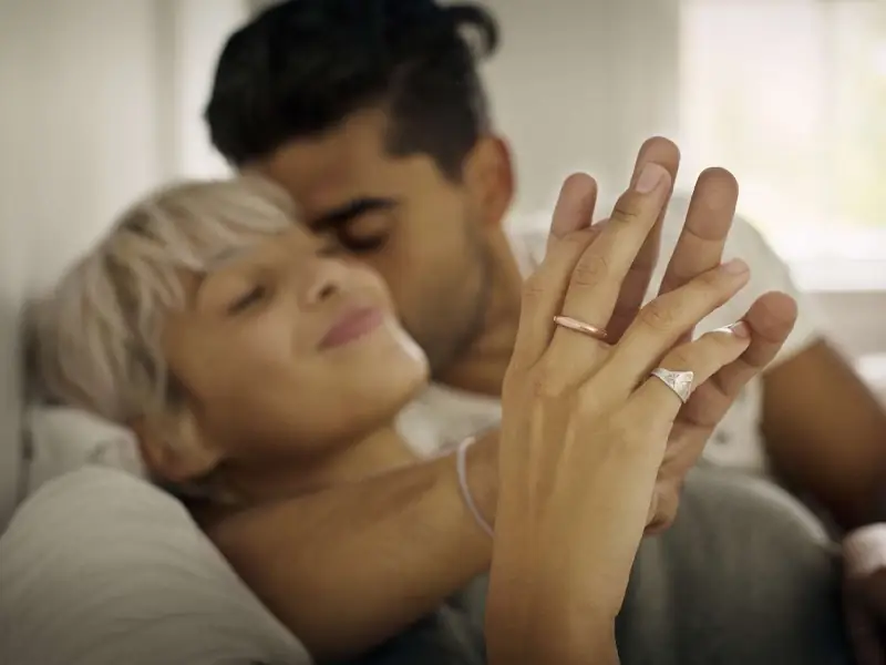 Couple holding hands in an intimate moment